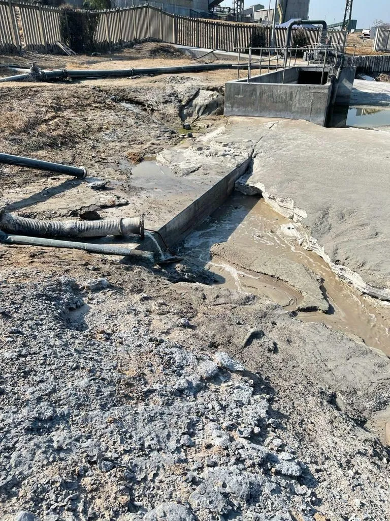 AB Sambane crew cleaning industrial infrastructure and piping